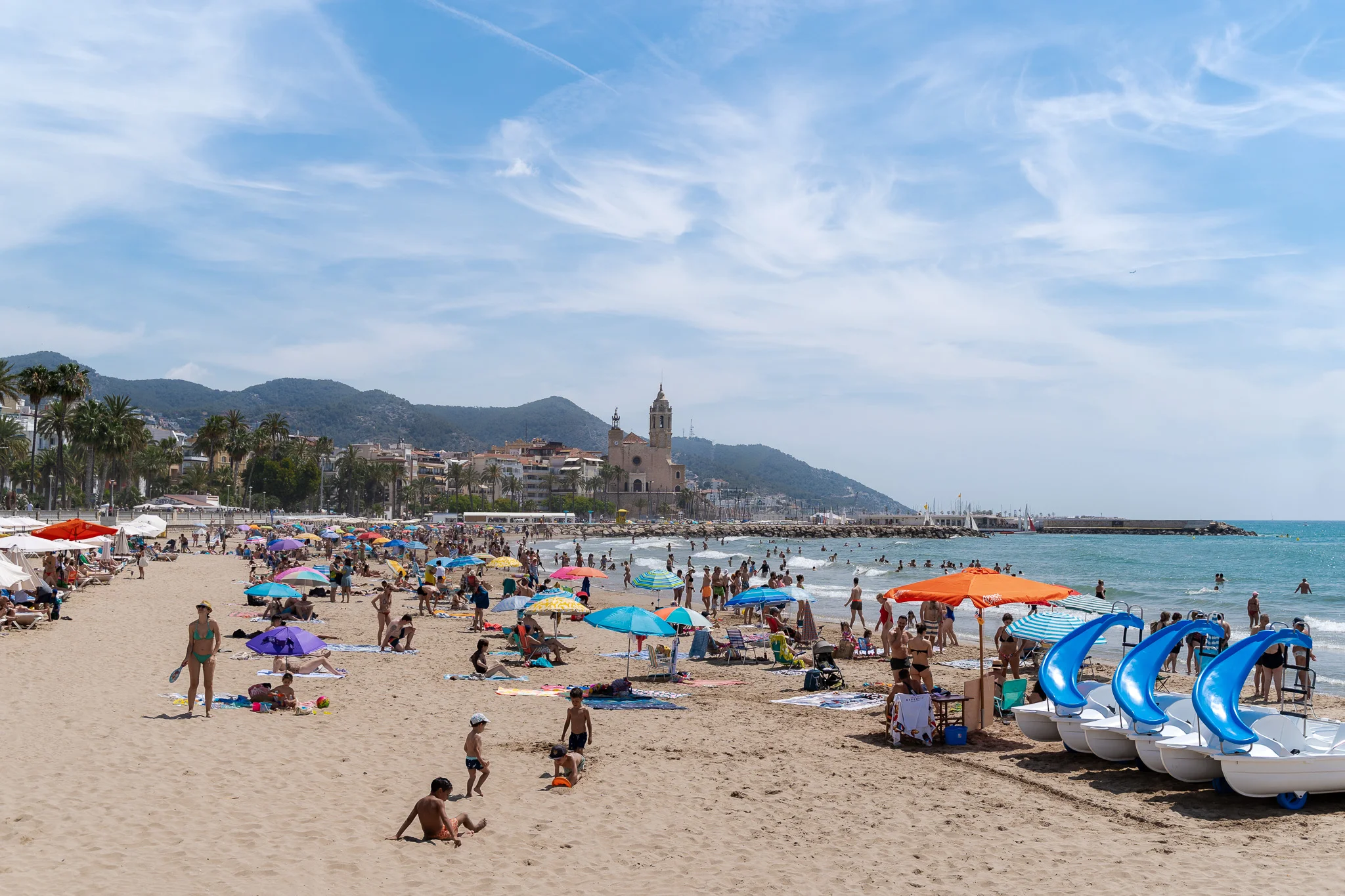 Beaches in Sitges - Platja de l'Estanyol with church view