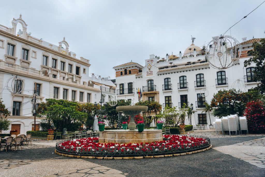 Things to do in Estepona, Spain - Plaza de las Flores full of flowers and orange trees