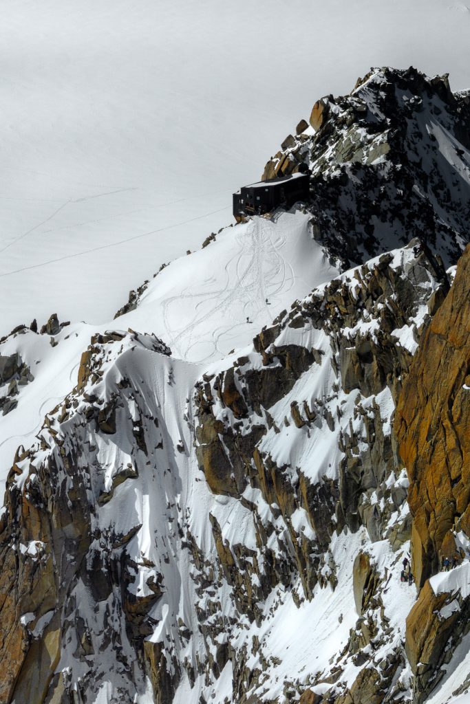 Climbers near Aiguille du Midi and Mont Blanc in Chamonix, France