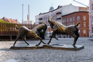 Sculpture of Poznan goats on Plac Kolegiacki square