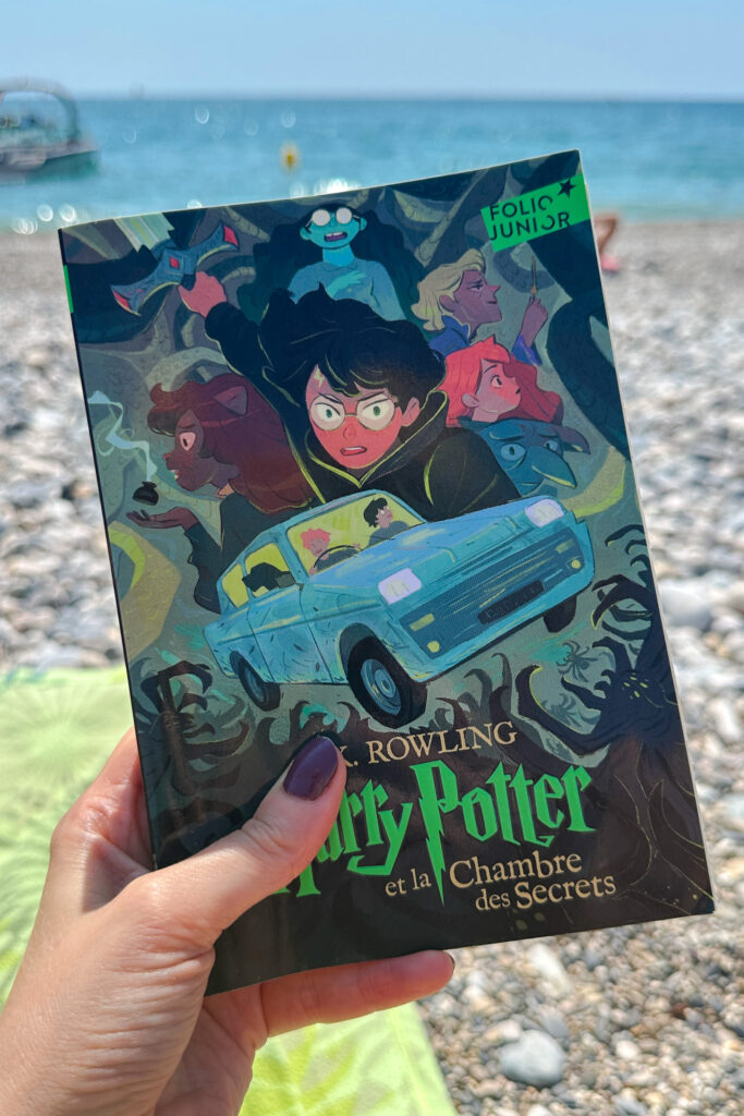 Reading French Harry Potter on the beach