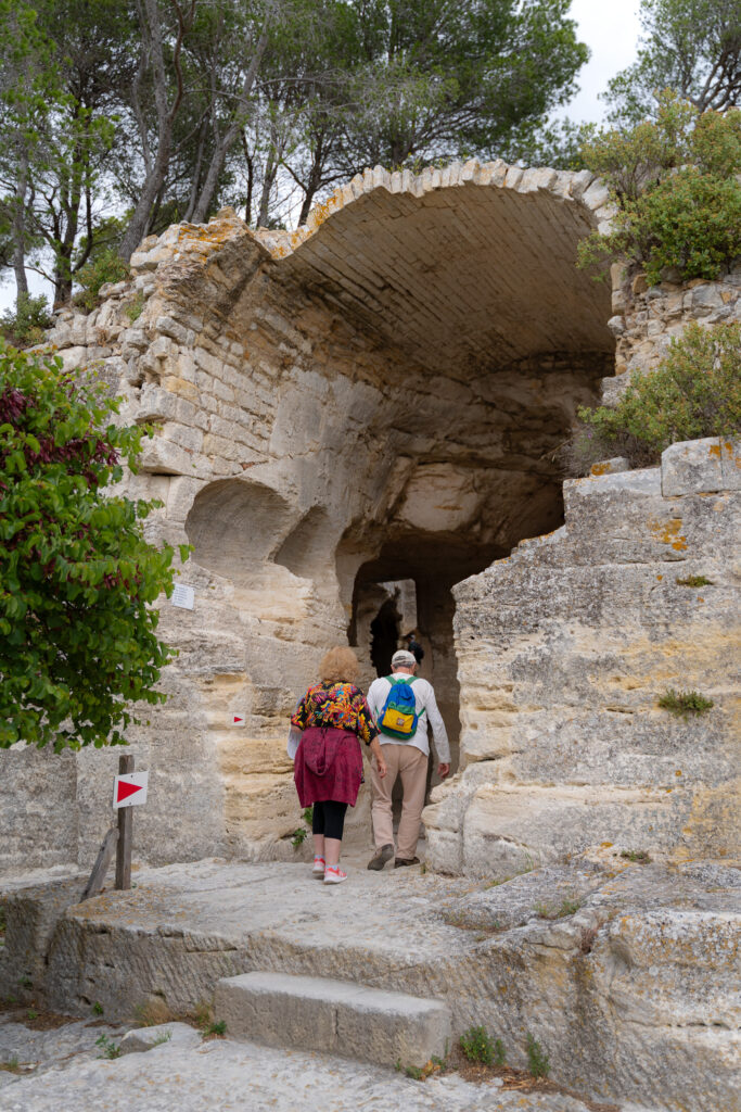 Exploring cave monastery of Saint-Roman Abbey
